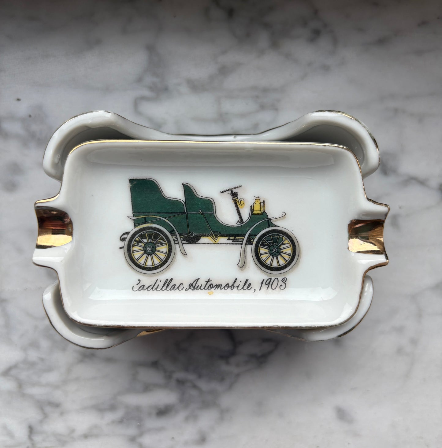 Mid-Century Porcelain Automobile Ashtray Set – 5 Pieces Gold Trim
